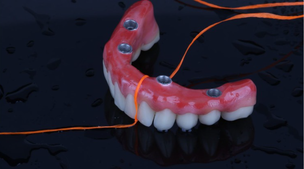 Leia mais sobre o artigo Como passar fio dental na minha prótese protocolo?